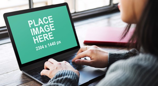 Woman working on Space Gray MacBook
