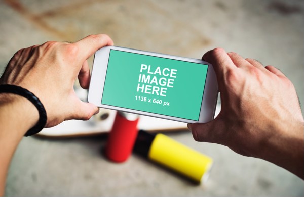 Man holding iPhone 5