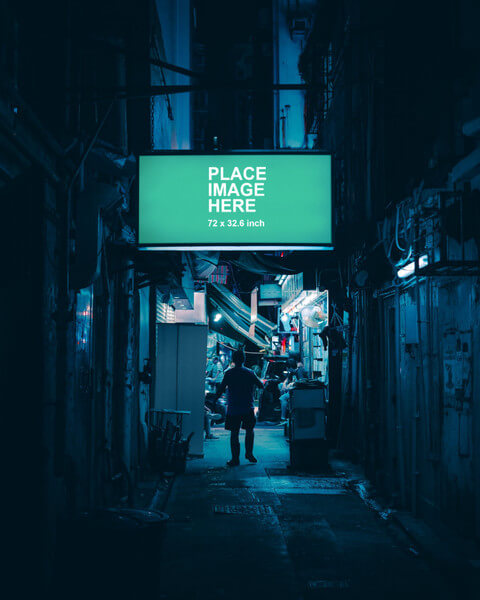 Light box sign in dark alleyway