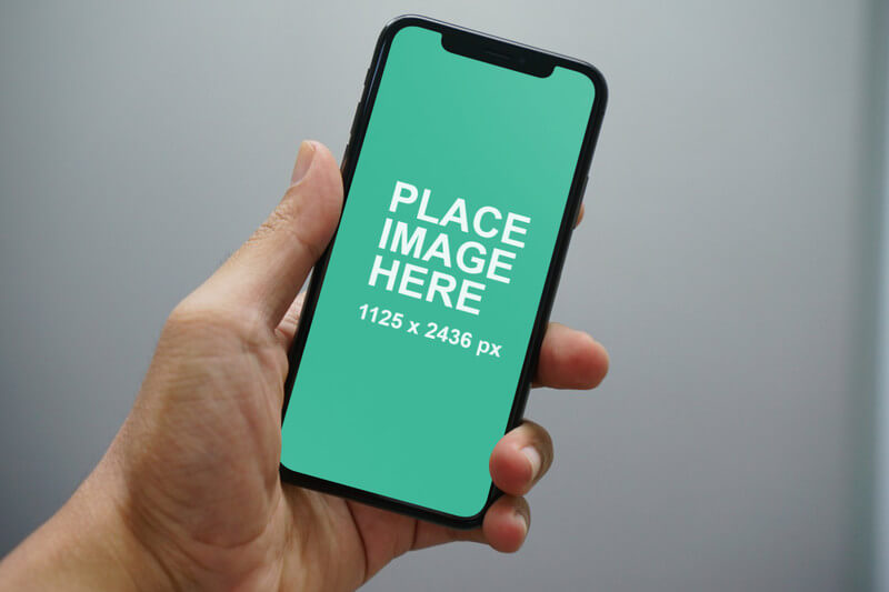 Man holding iPhone X