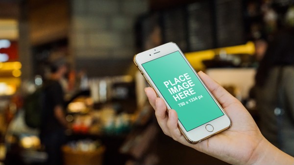 Woman holding iPhone