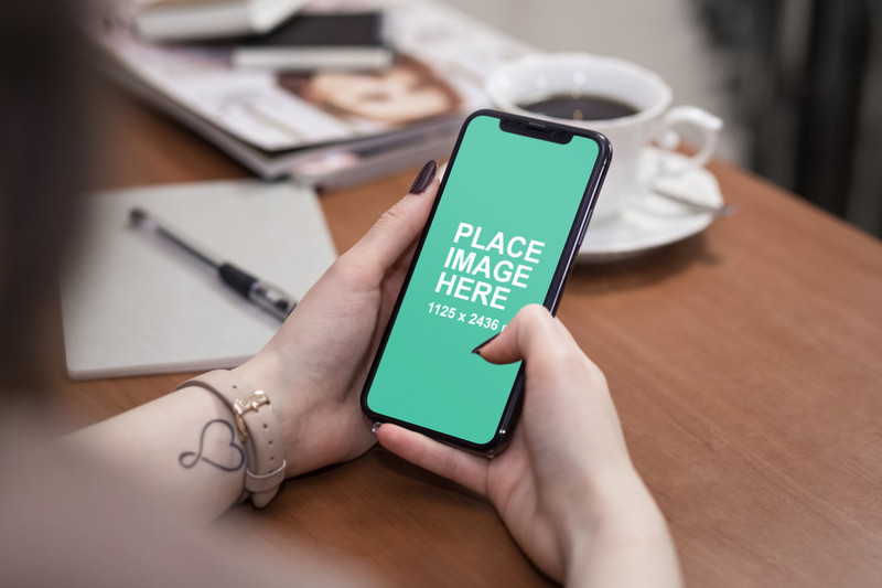 Woman using iPhone X